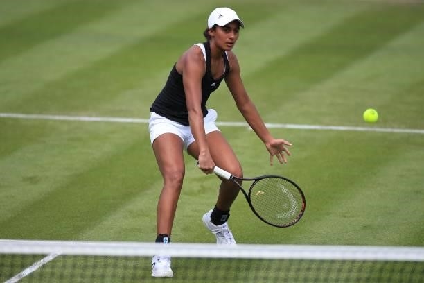 Naiktha Baines of Great Britain in action against Vitalia Diatchenko of Russia in qualifying warms up playing football during the Viking Classic...