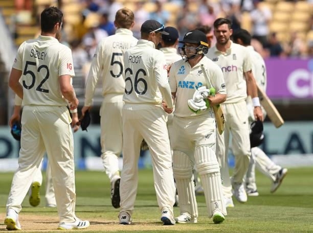 Tom Latham of New Zealand shakes hands with Joe Root of England after New Zealand won the second LV= Test match at Edgbaston on June 13, 2021 in...