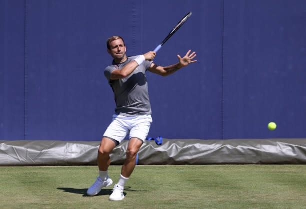 Dan Evans of Great Britain in action on the practice courts during the cinch Championships 2021 at The Queen's Club on June 13, 2021 in London,...