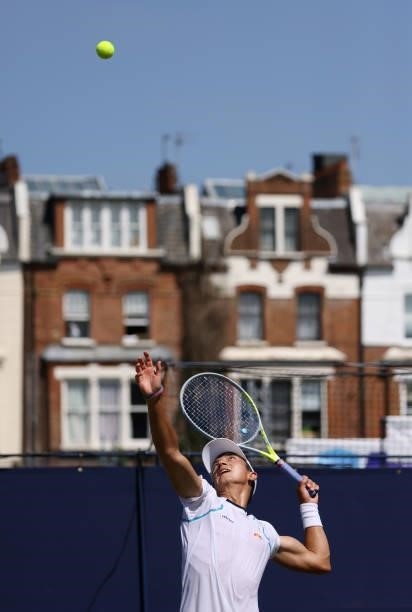 Ryan Peniston of Great Britain serves during his Men's Singles Qualifying match against Aleksandar Vukic of Australia at the cinch Championships 2021...