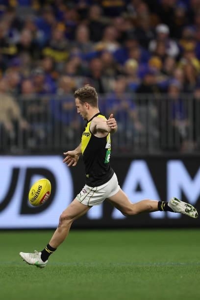 Kane Lambert of the Tigers in action during the round 14 AFL match between the West Coast Eagles and the Richmond Tigers at Optus Stadium on June 13,...