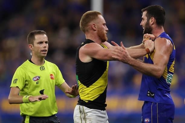 Nick Vlastuin of the Tigers and Jack Darling of the Eagles exchange words during the round 14 AFL match between the West Coast Eagles and the...