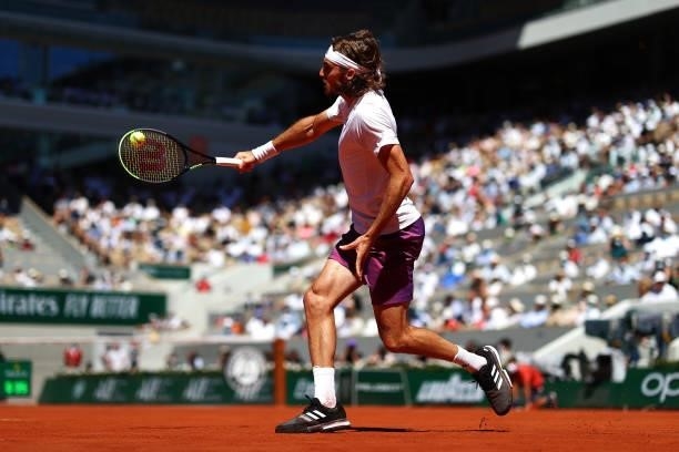 Stefanos Tsitsipas of Greece plays a backhand in his Men's Singles Final match against Novak Djokovic of Serbia during Day Fifteen of the 2021 French...