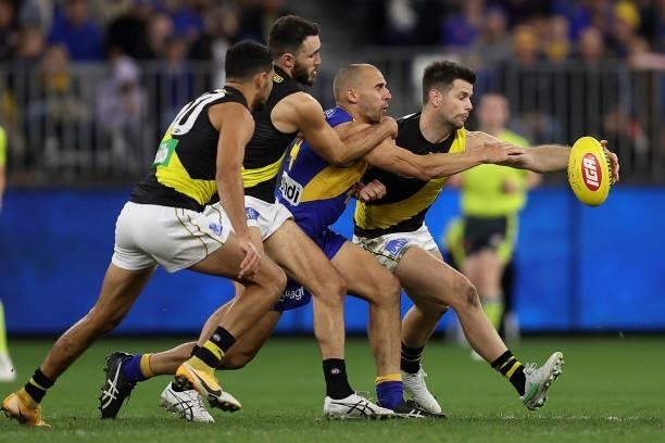 Dom Sheed of the Eagles and Trent Cotchin of the Tigers contest for the ball during the round 14 AFL match between the West Coast Eagles and the...