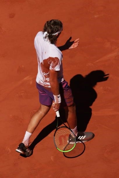 Clay is seen on the shirt of Stefanos Tsitsipas of Greece after he fell over in his Men's Singles Final match against Novak Djokovic of Serbia during...