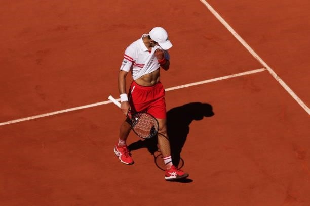 Novak Djokovic of Serbia looks dejected in his Men's Singles Final match against Stefanos Tsitsipas of Greece during Day Fifteen of the 2021 French...