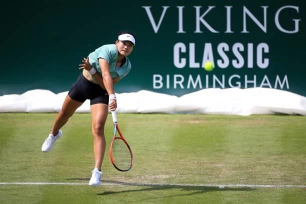 Yafan Wang of China in action against Marina Melnikova of Russia in qualifying during the Viking Classic Birmingham at Edgbaston Priory Club on June...