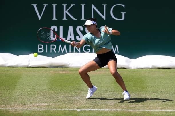 Yafan Wang of China in action against Marina Melnikova of Russia in qualifying during the Viking Classic Birmingham at Edgbaston Priory Club on June...