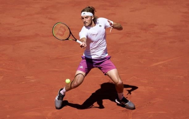 Stefanos Tsitsipas of Greece plays a forehand shot in his Men's Singles Final match against Novak Djokovic of Serbia during day fifteen of the 2021...