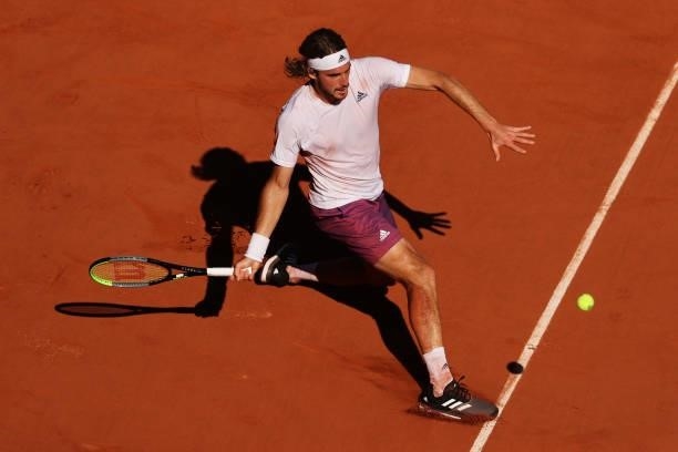 Stefanos Tsitsipas of Greece plays a forehand in his Men's Singles Final match against Novak Djokovic of Serbia during Day Fifteen of the 2021 French...