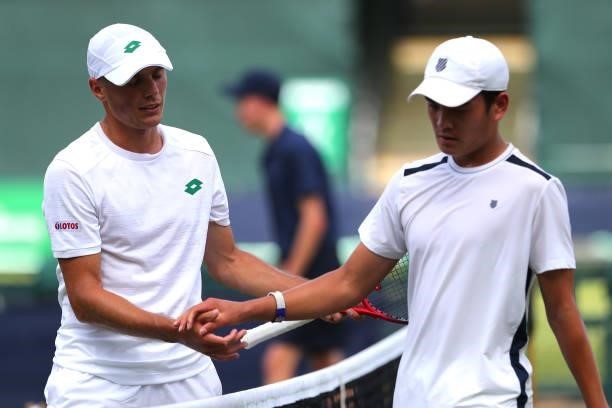 Kacper Zuk of Poland is congratulated by Lui Maxted after he wins during day 1 of the Nottingham Trophy at Nottingham Tennis Centre on June 13, 2021...