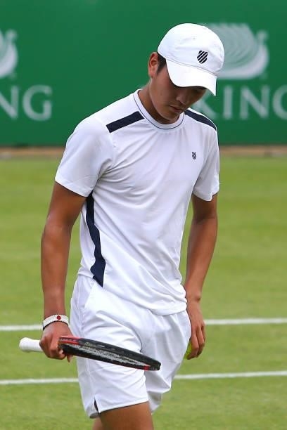 Lui Maxted of Great Britain looks quizzically at his racket during day 1 of the Nottingham Trophy at Nottingham Tennis Centre on June 13, 2021 in...