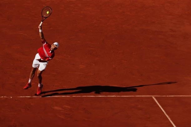 Novak Djokovic of Serbia serves in his Men's Singles Final match against Stefanos Tsitsipas of Greece during Day Fifteen of the 2021 French Open at...