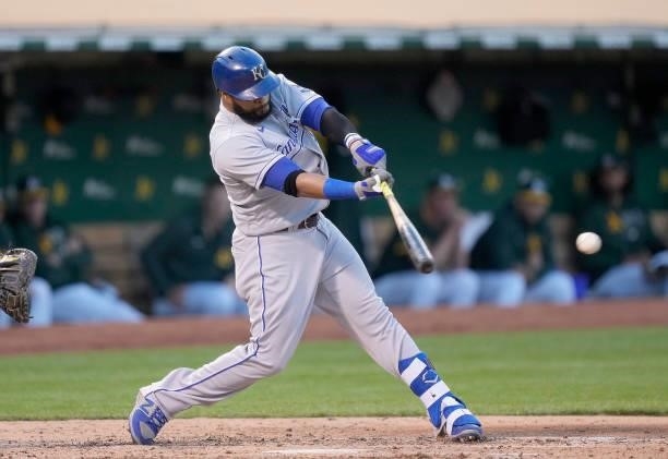 Carlos Santana of the Kansas City Royals bats against the Oakland Athletics in the top of the seventh inning at RingCentral Coliseum on June 11, 2021...
