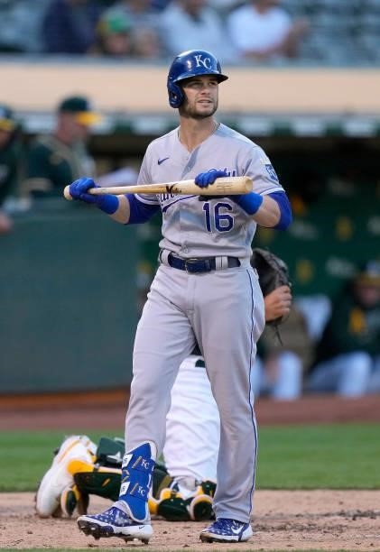 Andrew Benintendi of the Kansas City Royals reacts after he was called out on strikes against the Oakland Athletics in the top of the fourth inning...