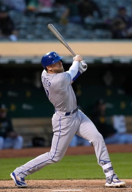 Hunter Dozier of the Kansas City Royals bats against the Oakland Athletics in the top of the seventh inning at RingCentral Coliseum on June 11, 2021...