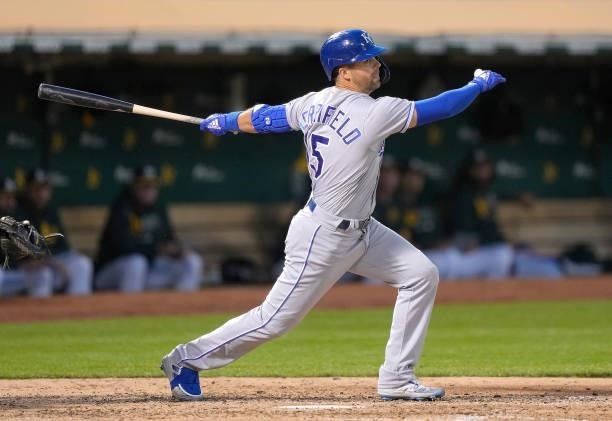 Whit Merrifield of the Kansas City Royals bats against the Oakland Athletics in the top of the seventh inning at RingCentral Coliseum on June 11,...