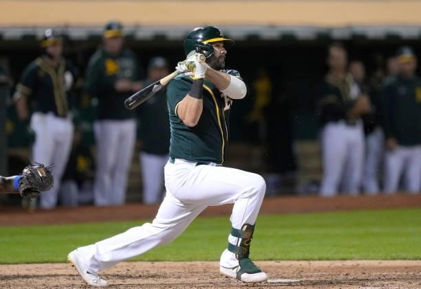 Mitch Moreland of the Oakland Athletics bats against the Kansas City Royals in the bottom of the ninth inning at RingCentral Coliseum on June 11,...
