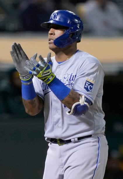Salvador Perez of the Kansas City Royals celebrates after hitting a solo home run against the Oakland Athletics in the top of the eighth inning at...