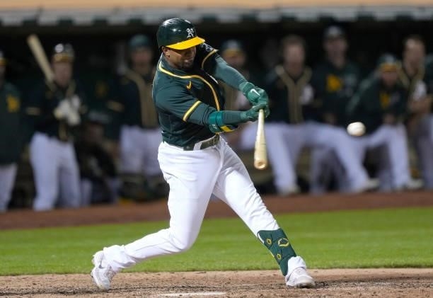 Elvis Andrus of the Oakland Athletics hits a walk-off RBI single to score Matt Chapman and defeat the Kansas City Royals 4-3 in the bottom of the...
