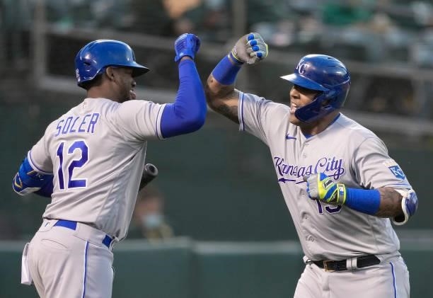 Salvador Perez and Jorge Soler of the Kansas City Royals celebrates after Perez hit a solo home run against the Oakland Athletics in the top of the...