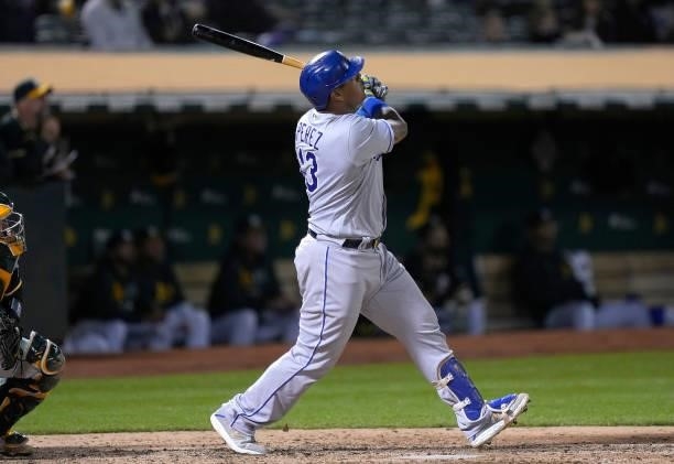 Salvador Perez of the Kansas City Royals hits a solo home run against the Oakland Athletics in the top of the eighth inning at RingCentral Coliseum...