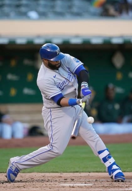 Carlos Santana of the Kansas City Royals bats against the Oakland Athletics in the top of the fourth inning at RingCentral Coliseum on June 11, 2021...