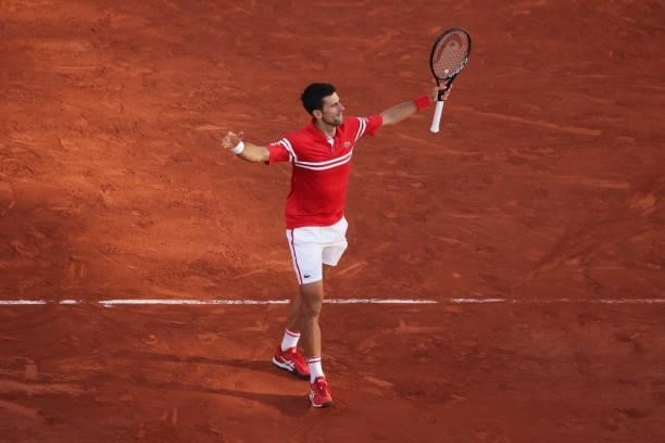 Novak Djokovic of Serbia celebrates a point in his Men's Singles Final match against Stefanos Tsitsipas of Greece during Day Fifteen of the 2021...