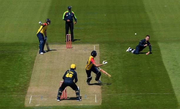 Marnus Labuschagne of Glamorgan fields off his own bowling during the Vitality T20 Blast match between Glamorgan and Essex at Sophia Gardens on June...