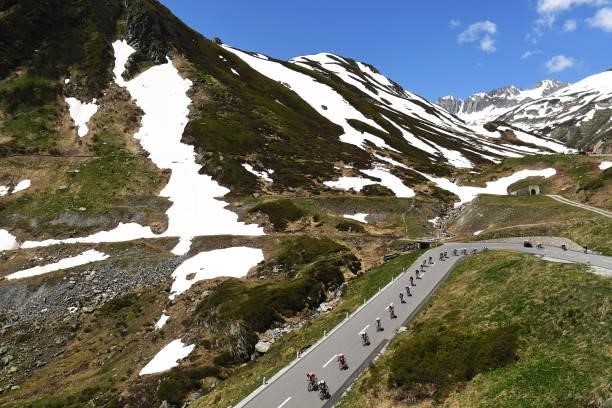 The peloton passing through Oberalppass mountain landscape during the 84th Tour de Suisse 2021, Stage 8 a 159,5km stage from Andermatt to Andermatt /...
