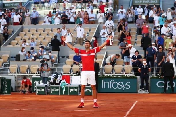 Novak Djokovic of Serbia celebrates victory after winning his Men's Singles Final match against Stefanos Tsitsipas of Greece during Day Fifteen of...