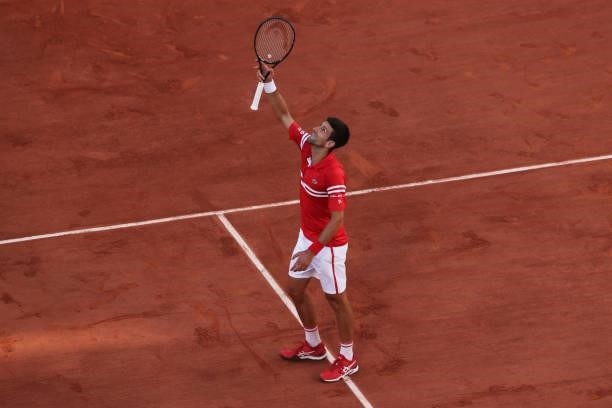 Novak Djokovic of Serbia celebrates victory after winning his Men's Singles Final match against Stefanos Tsitsipas of Greece during Day Fifteen of...