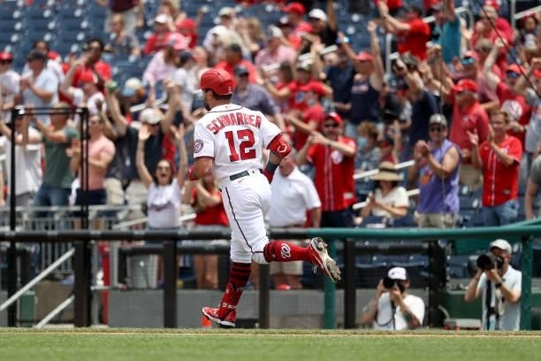 Kyle Schwarber of the Washington Nationals rounds the bases after hitting a three run home run in the second inning against the San Francisco Giants...