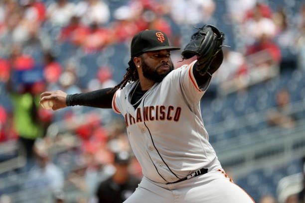 Starting pitcher Johnny Cueto of the San Francisco Giants throws to a Washington Nationals batter in the third inning at Nationals Park on June 13,...