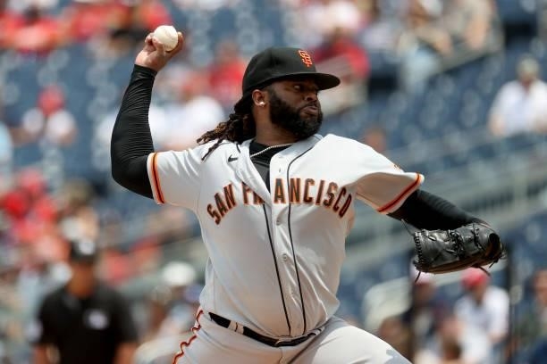 Starting pitcher Johnny Cueto of the San Francisco Giants throws to a Washington Nationals batter in the third inning at Nationals Park on June 13,...