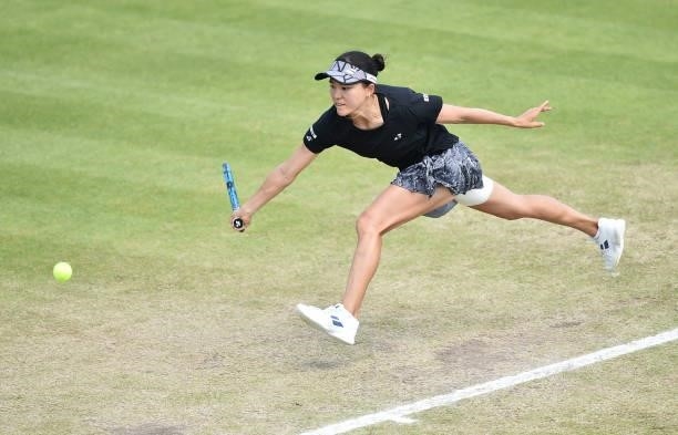 Makoto Ninomya of Japan plays a forehand shot during the women’s doubles final against Caroline Dolehide and Storm Sanders at Nottingham Tennis...