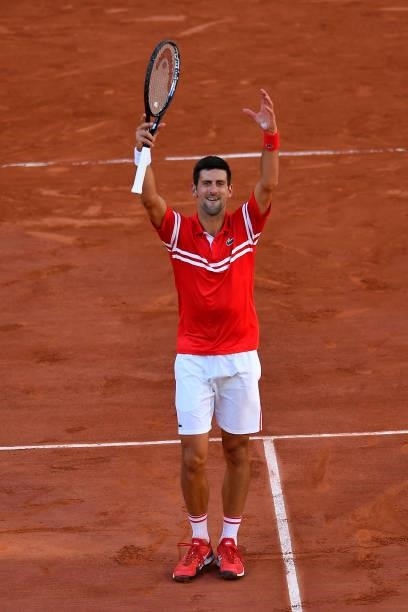 Novak Djokovic of Serbia reacts after winning his Men's Singles Final match against Stefanos Tsitsipas of Greece during Day Fifteen of the 2021...