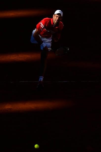 Novak Djokovic of Serbia serves in his Men's Singles Final match against Stefanos Tsitsipas of Greece during Day Fifteen of the 2021 French Open at...