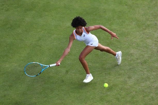 Ranah Akua Stoiber of Great Britain hits a forehand in her match against Elena Gabriela Ruse of Romania during day 1 of the Nottingham Trophy at...