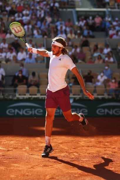 Stefanos Tsitsipas of Greece plays a backhand in his Men's Singles Final match against Novak Djokovic of Serbia during Day Fifteen of the 2021 French...