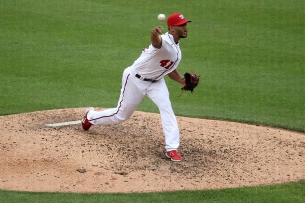 Starting pitcher Joe Ross of the Washington Nationals throws to a San Francisco Giants batter in the eighth inning at Nationals Park on June 13, 2021...