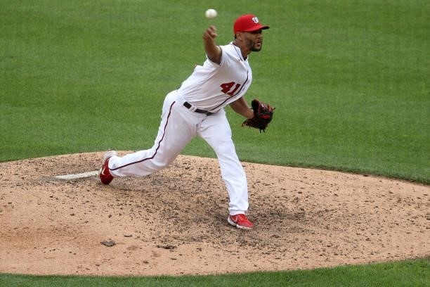Starting pitcher Joe Ross of the Washington Nationals throws to a San Francisco Giants batter in the eighth inning at Nationals Park on June 13, 2021...