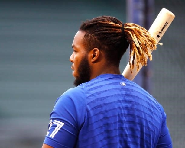 Vladimir Guerrero Jr. #27 of the Toronto Blue Jays looks on during batting practice before the game against the Boston Red Sox at Fenway Park on June...