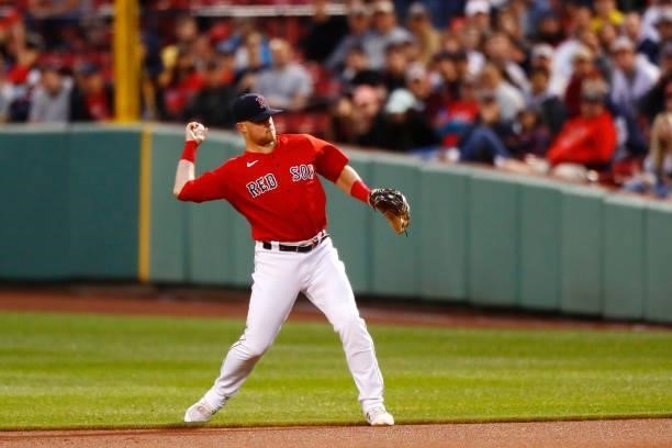 Christian Arroyo of the Boston Red Sox throws to first base at the top of the second inning of the game against the Toronto Blue Jays at Fenway Park...