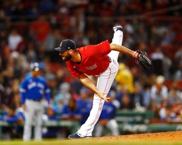 Relief pitcher Brandon Workman of the Boston Red Sox pitches at the top of the seventh inning of the game against the Toronto Blue Jays at Fenway...