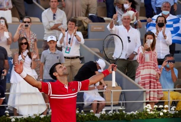 Novak Djokovic of Serbia celebrates victory after winning in his Men's Singles Final match against Stefanos Tsitsipas of Greece during day fifteen of...