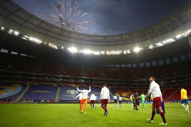 Players of Venezuela and Brazil enter the pitch before a Group B match between Brazil and Venezuela as part of Copa America 2021 at Mane Garrincha...