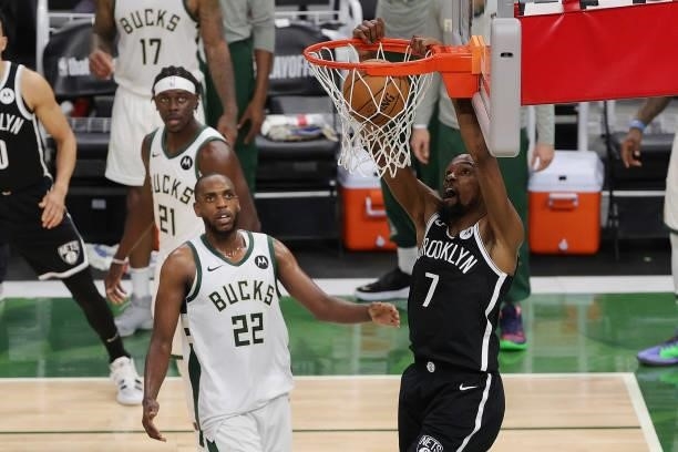 Kevin Durant of the Brooklyn Nets dunks against the Milwaukee Bucks during the second half of Game Four of the Eastern Conference second round...