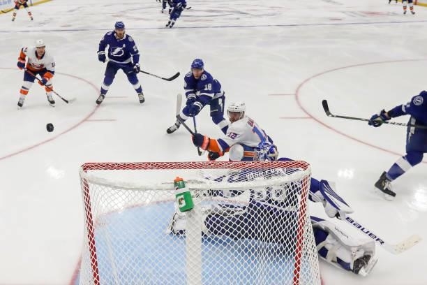 Andrei Vasilevskiy of the Tampa Bay Lightning makes the save against Josh Bailey of the New York Islanders during the second period in Game One of...