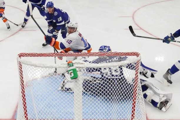 Andrei Vasilevskiy of the Tampa Bay Lightning makes the save against Josh Bailey of the New York Islanders during the second period in Game One of...